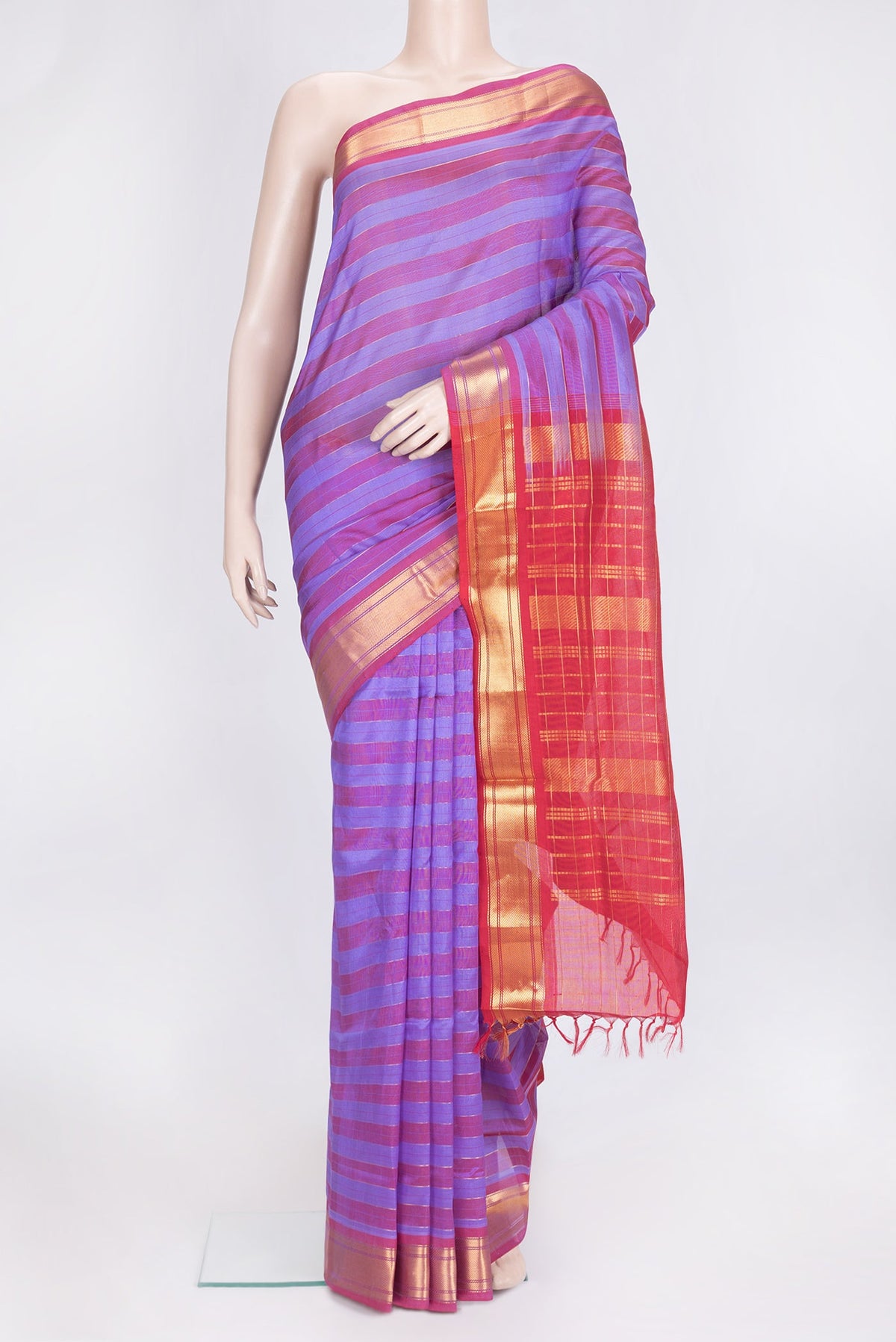 Lavender and Maroon Color Silk Cotton Saree with Stripes on the body and Zari Border.  displayed on a mannequin