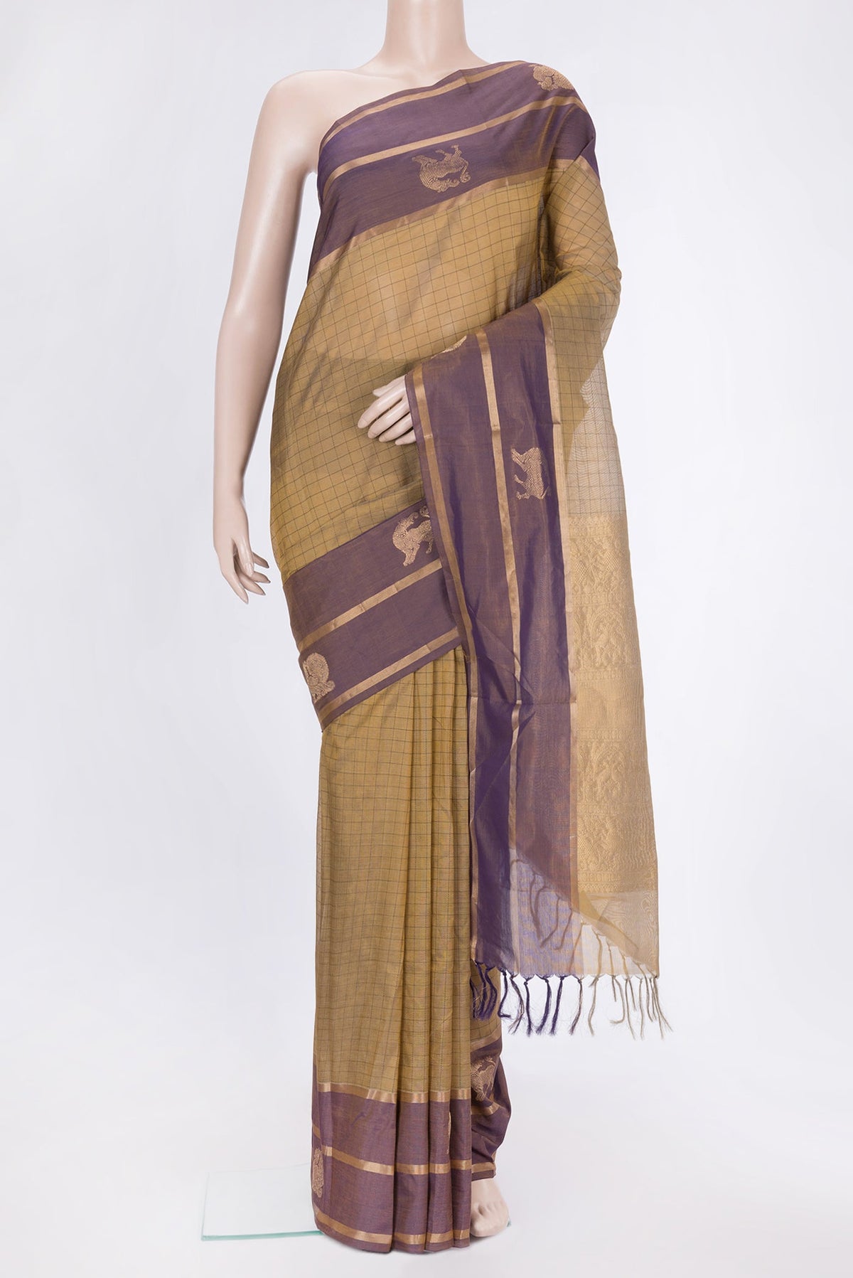 Gold Dual Tone Silk Cotton Saree with Thread Butta on the body and Fancy Border.  displayed on a mannequin