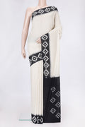 Off White Dual Tone Double Ikat Saree with Checked design on the body and Ikat Border.  displayed on a mannequin