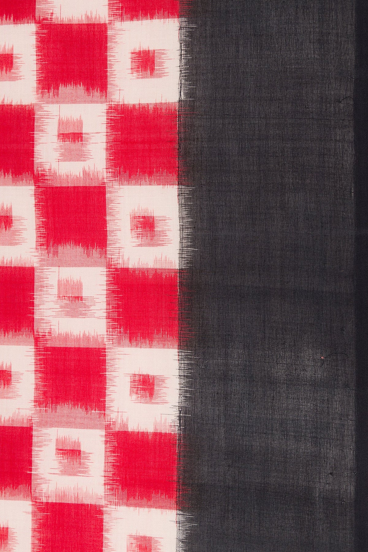 Border image of Red Dual Tone Double Ikat Saree with Ikat Print on the body and Plain Border. 