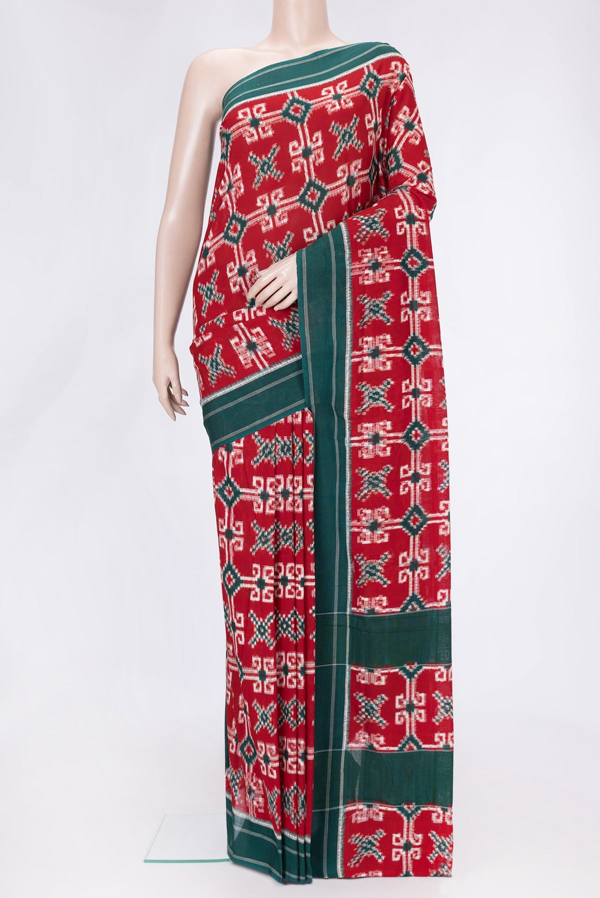 Red Dual Tone Double Ikat Saree with Ikat Print on the body and Thread Border.  displayed on a mannequin