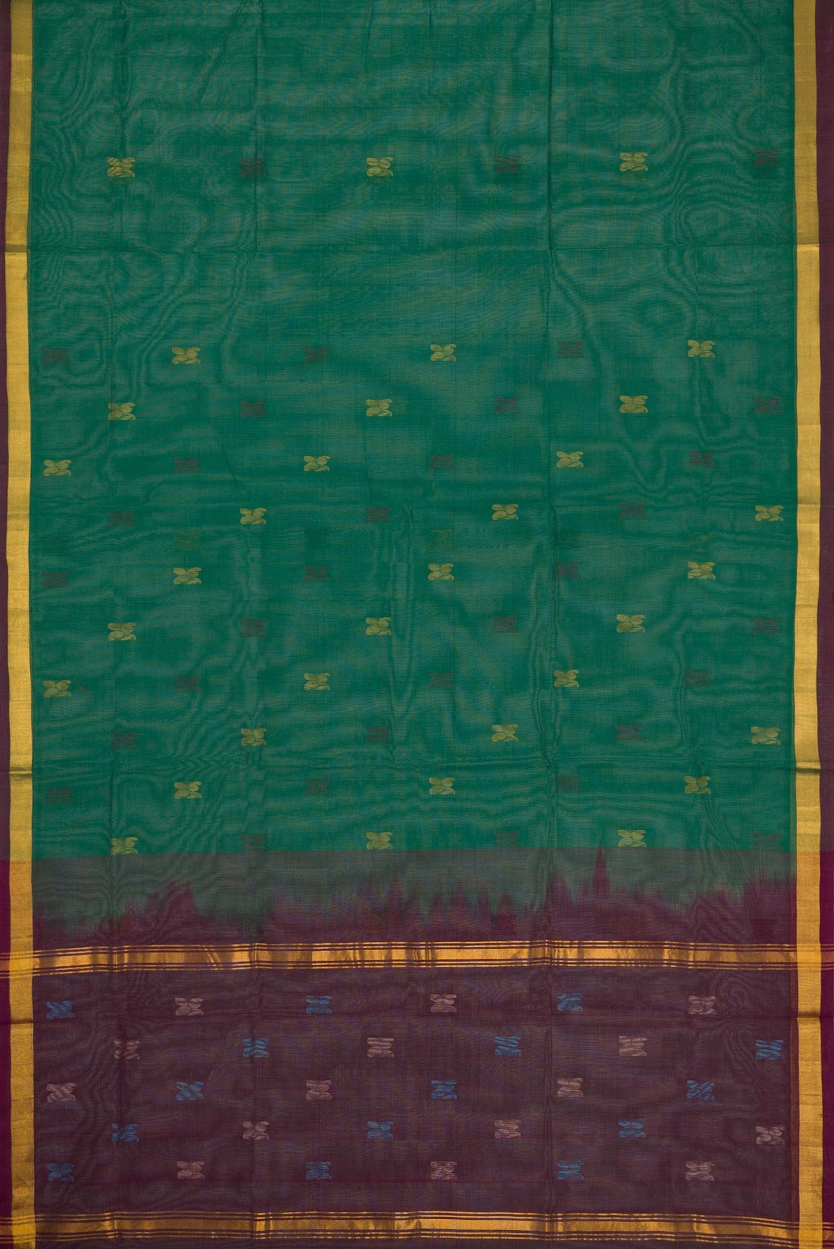 Flat view of Pista Green Dual Tone Uppada Cotton Saree with Zari Butta on the body and Zari Border. 