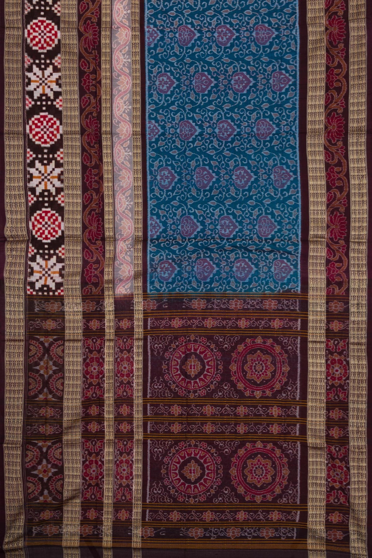 Flat view of Blue Dual Tone Double Ikat Saree with Ikat Print on the body and Thread Border. 