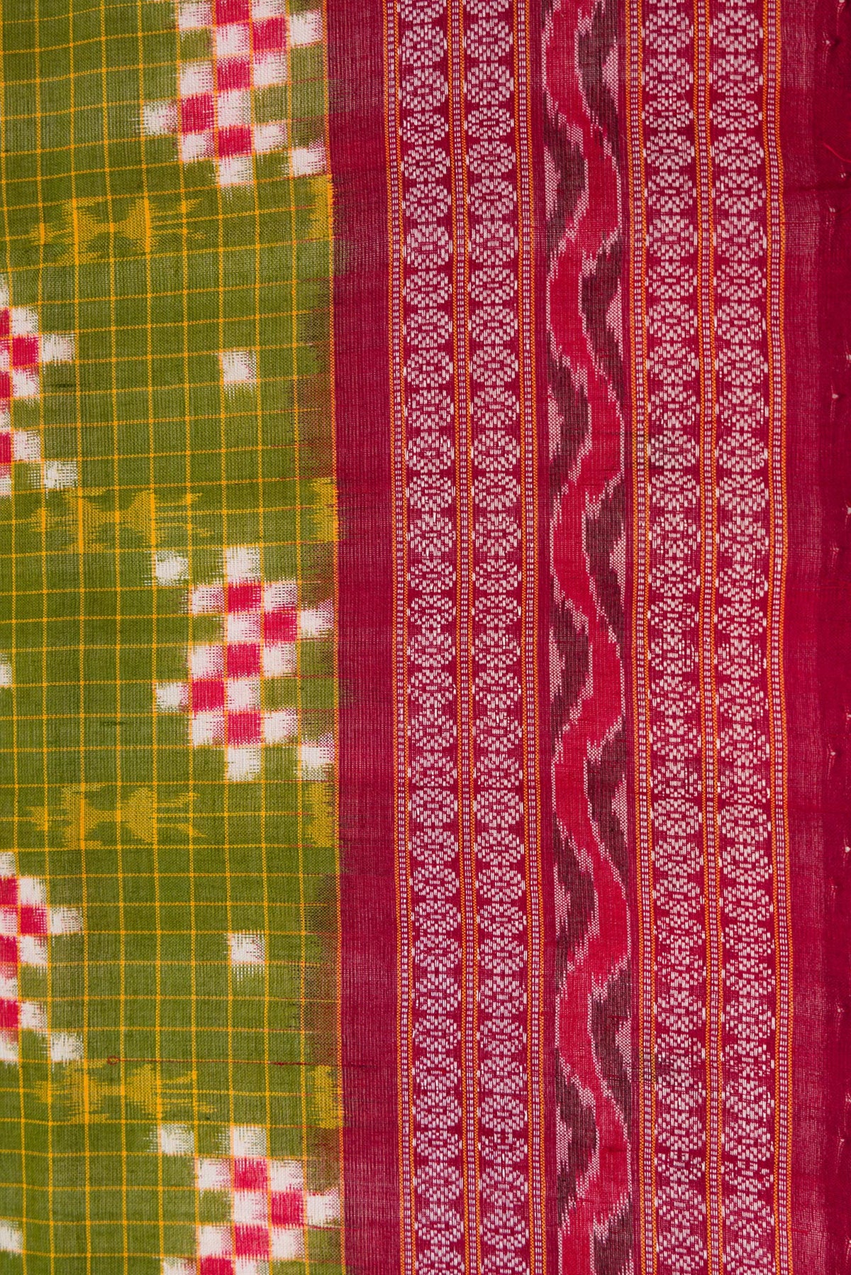 Border image of Green Dual Tone Double Ikat Saree with Ikat Print on the body and Thread Border. 