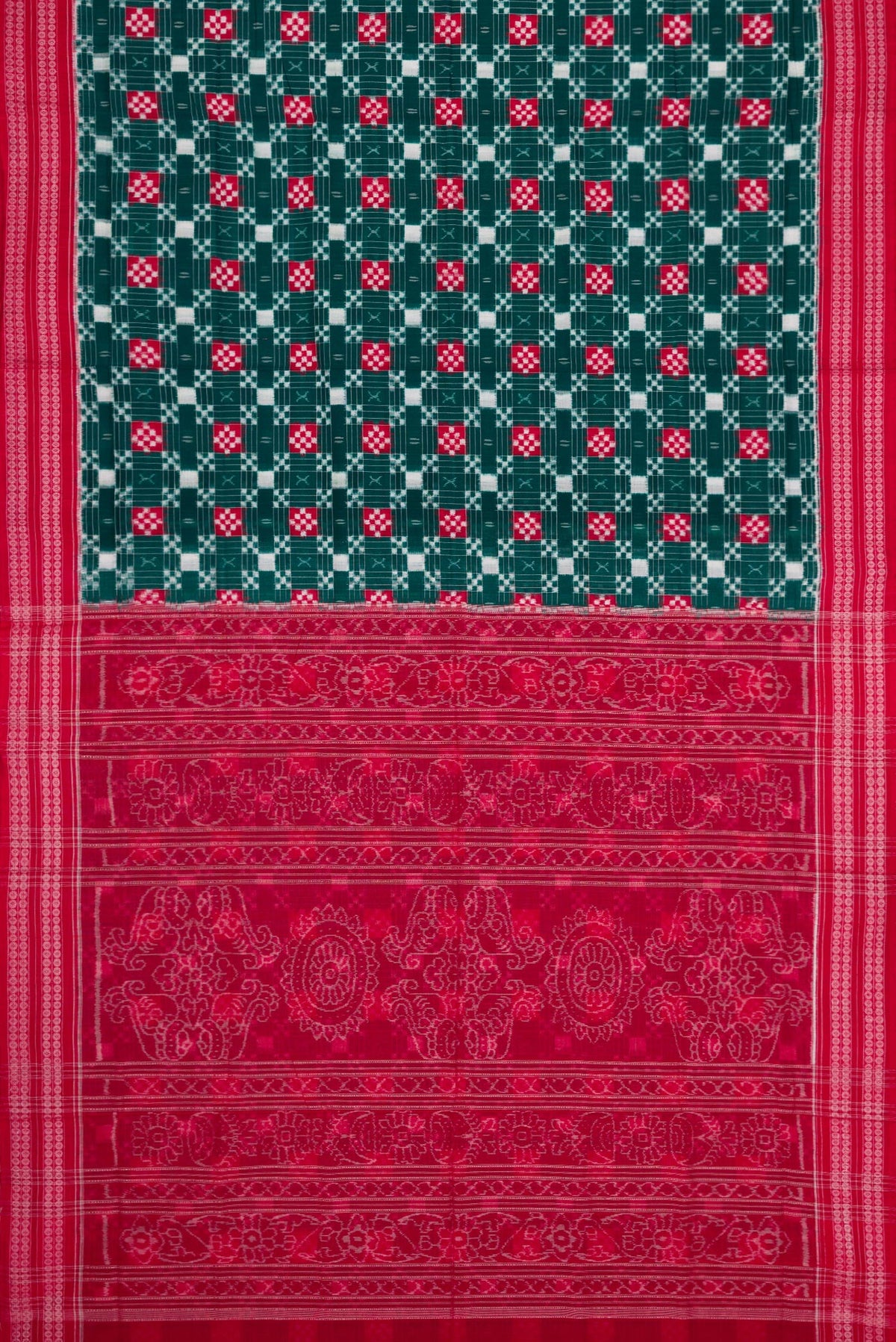 Flat view of Bottle Green Dual Tone Double Ikat Saree with Ikat Print on the body and Thread Border. 