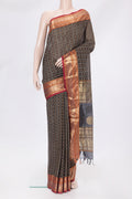 Black Silk Cotton Saree with Checked design on the body and Zari Border.  displayed on a mannequin