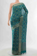 Blue Tussar Silk Saree with Ikat Print on the body and Zari Border displayed on a mannequin