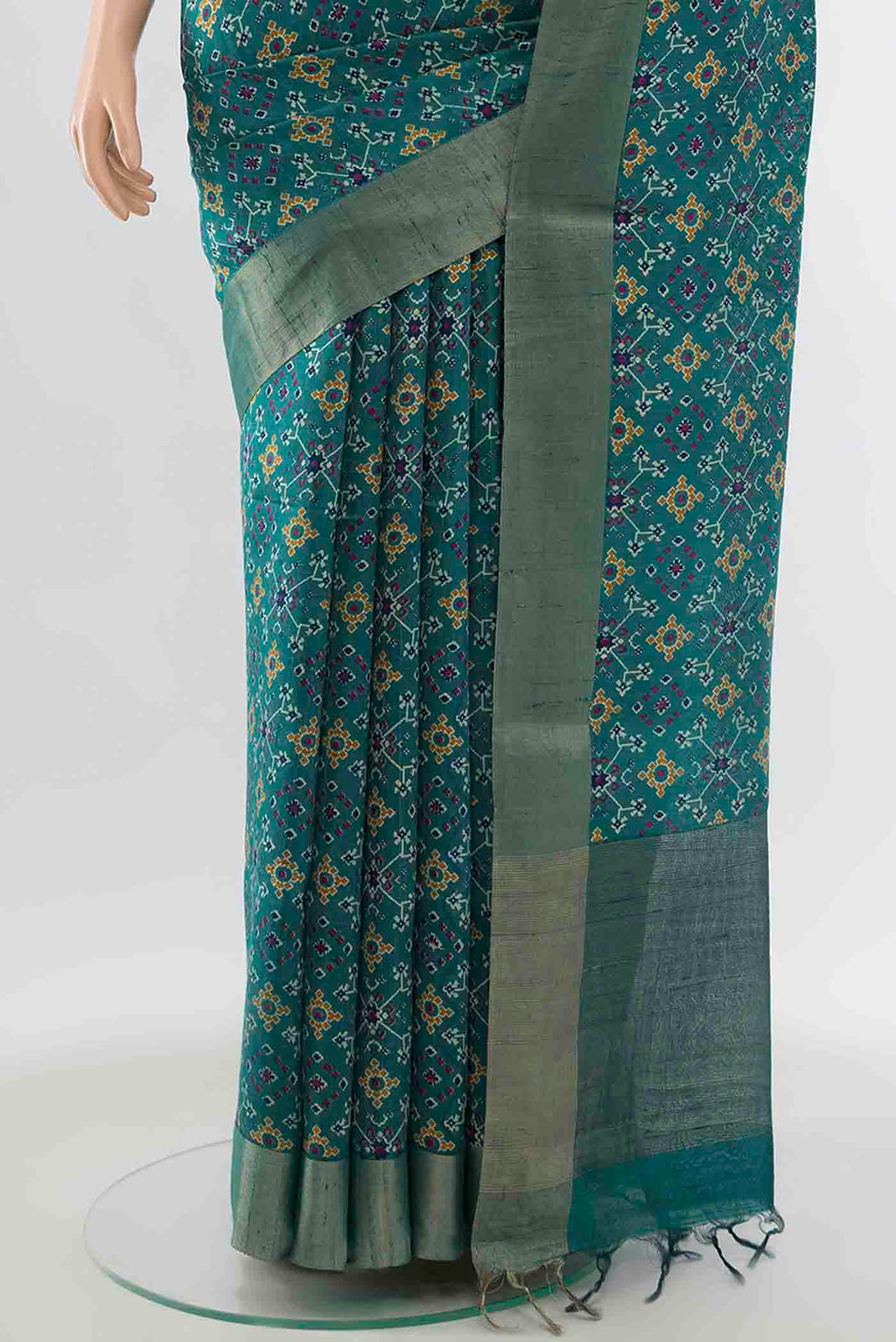 Pleats and pallu of Blue Tussar Silk Saree with Ikat Print on the body and Zari Border