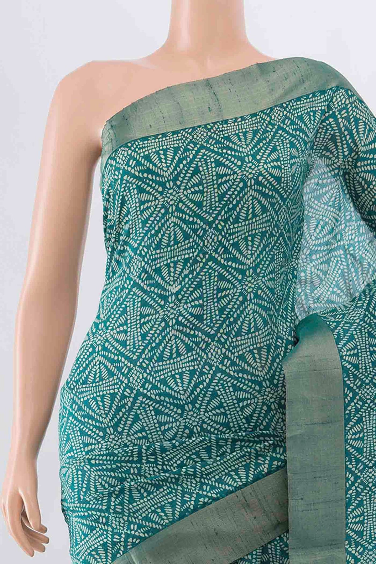 Border image of Blue Tussar Silk Saree with Printed design on the body and Zari Border