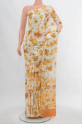 Off White Chiffon Saree with Zari Butta on the body and Silk Border.  displayed on a mannequin
