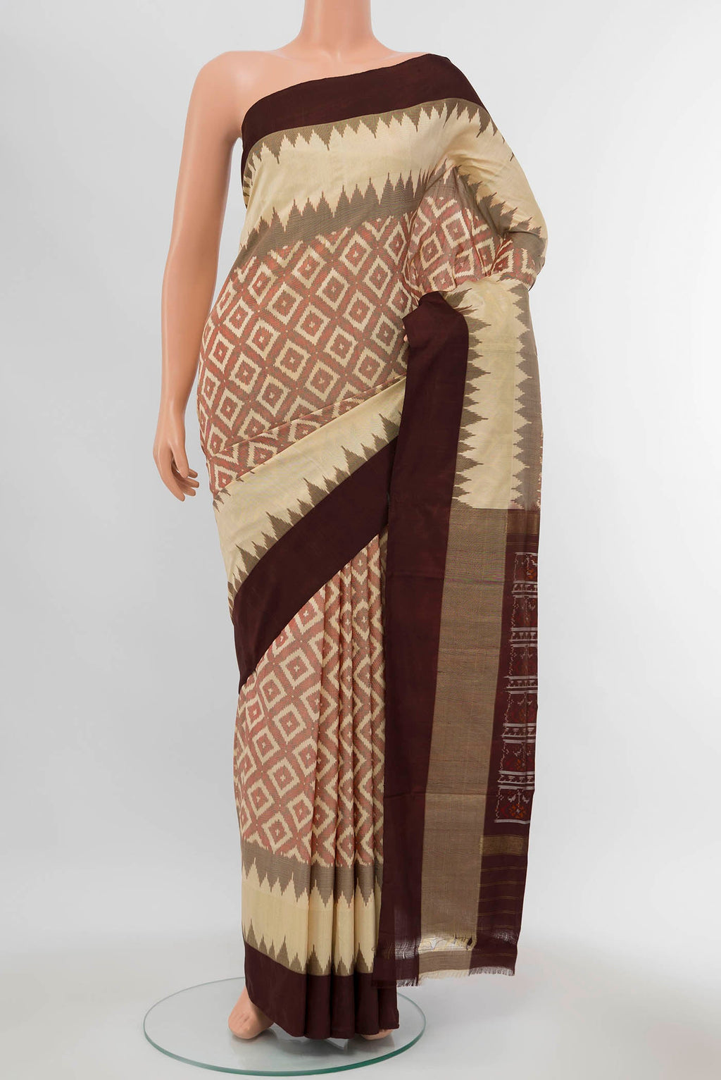 Cream Pochampally Silk Saree with Zari Butta on the body and Silk Border displayed on a mannequin
