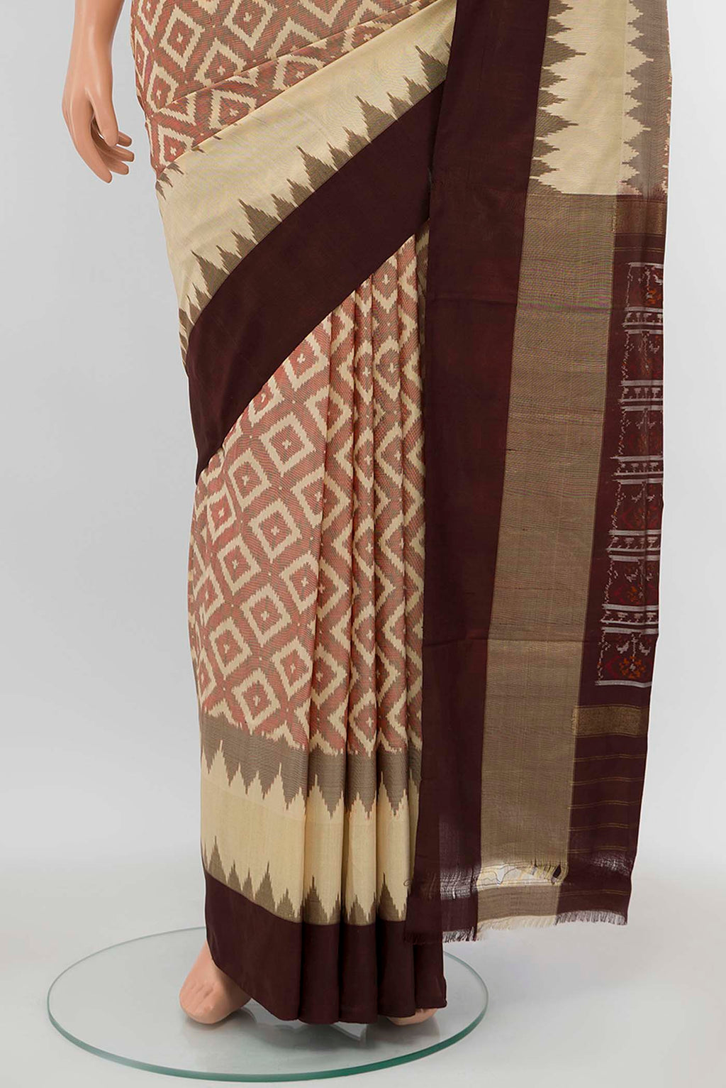 Pleats and pallu of Cream Pochampally Silk Saree with Zari Butta on the body and Silk Border