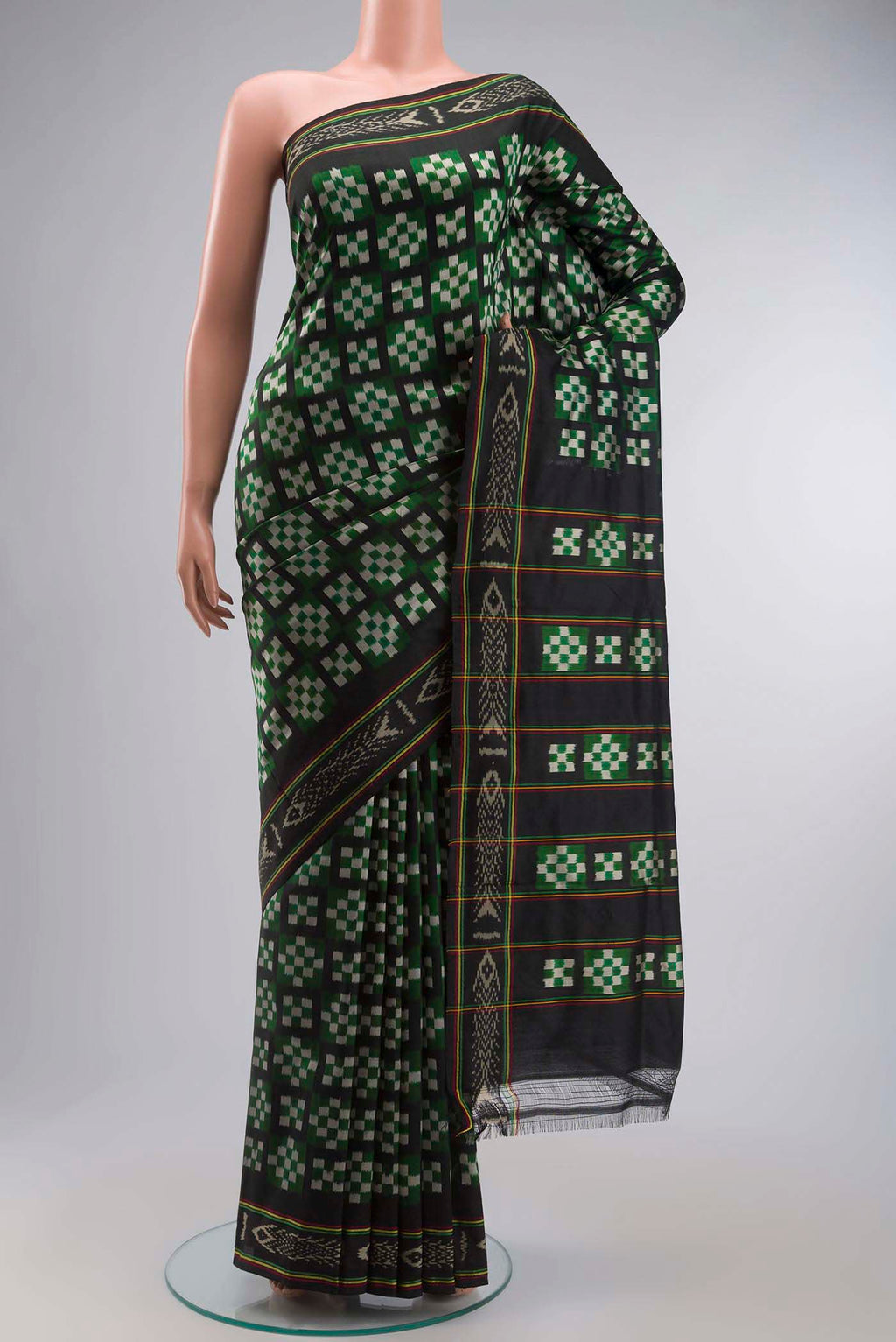 Multi Color Pochampally Silk Saree with Pure Ikat on the body and Ikat Border displayed on a mannequin
