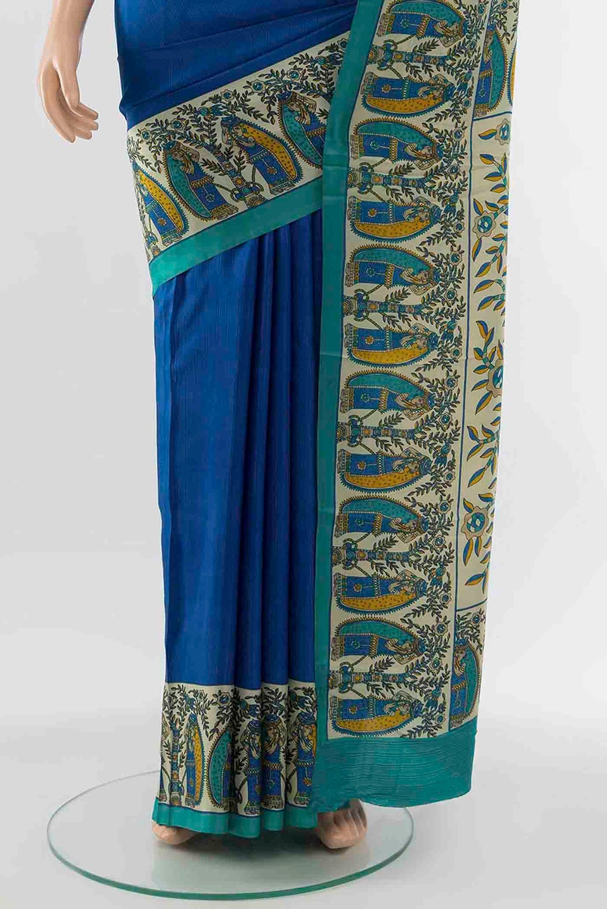 Pleats and pallu of Blue Printed Silk Saree with Floral Print on the body and Silk Border