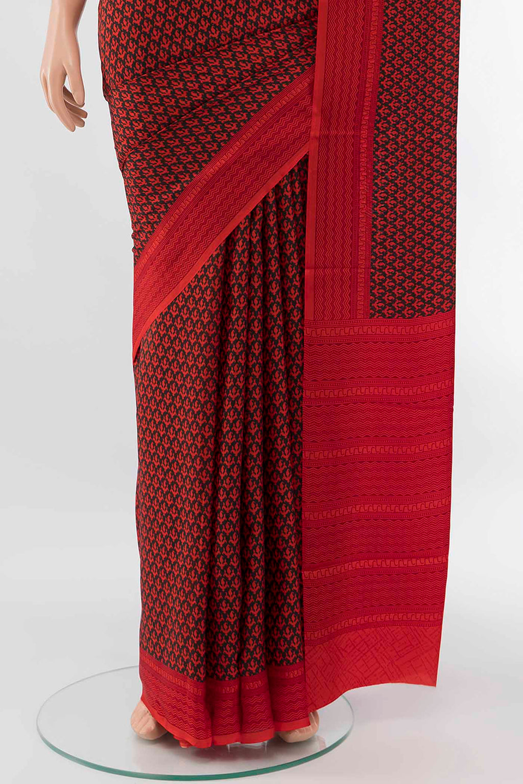 Pleats and pallu of Black Printed Silk Saree with Floral Print on the body and Attached Border