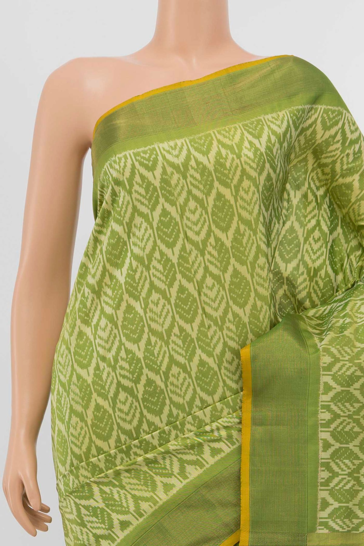 Border image of Green Pochampally Silk Saree with Ikat Print on the body and Zari Border