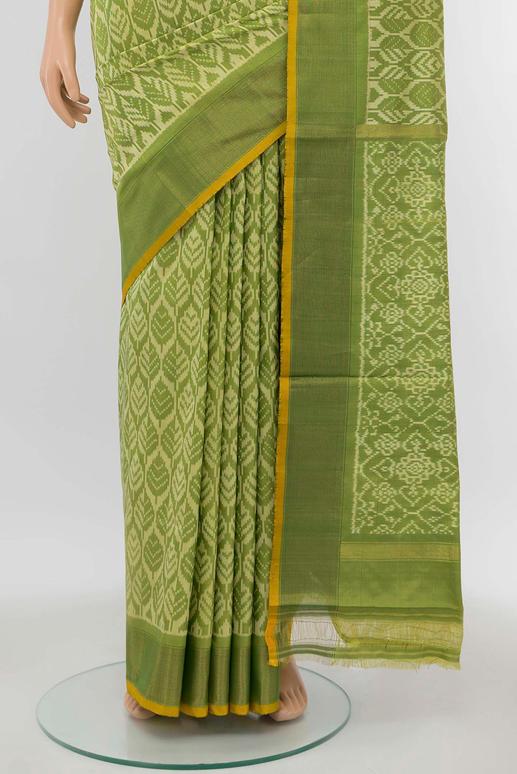 Pleats and pallu of Green Pochampally Silk Saree with Ikat Print on the body and Zari Border