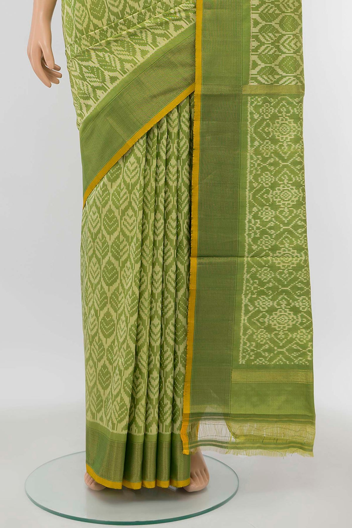 Pleats and pallu of Green Pochampally Silk Saree with Ikat Print on the body and Zari Border