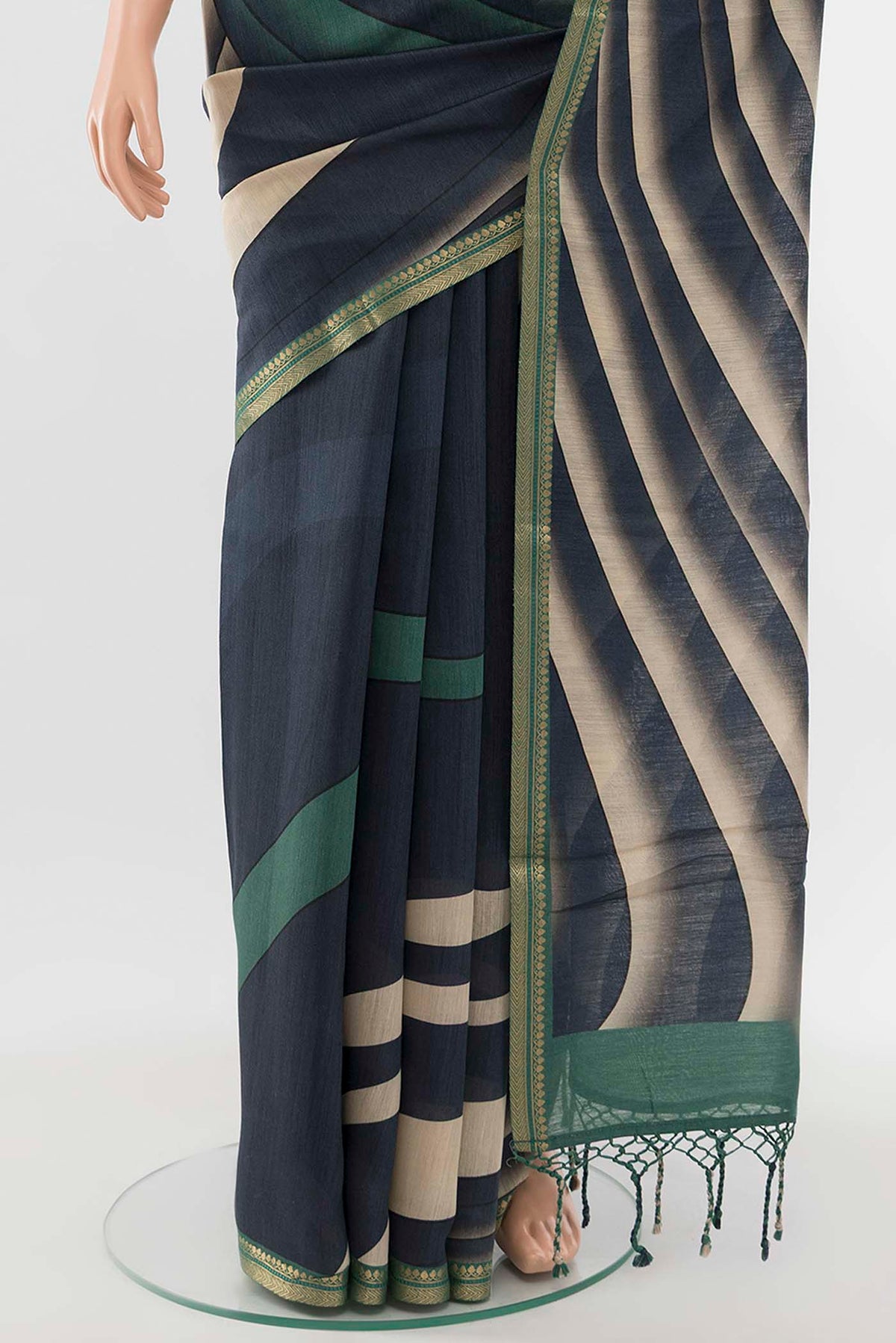 Pleats and pallu of Navy Blue Tussar Silk Saree with Floral Print on the body and Silk Border