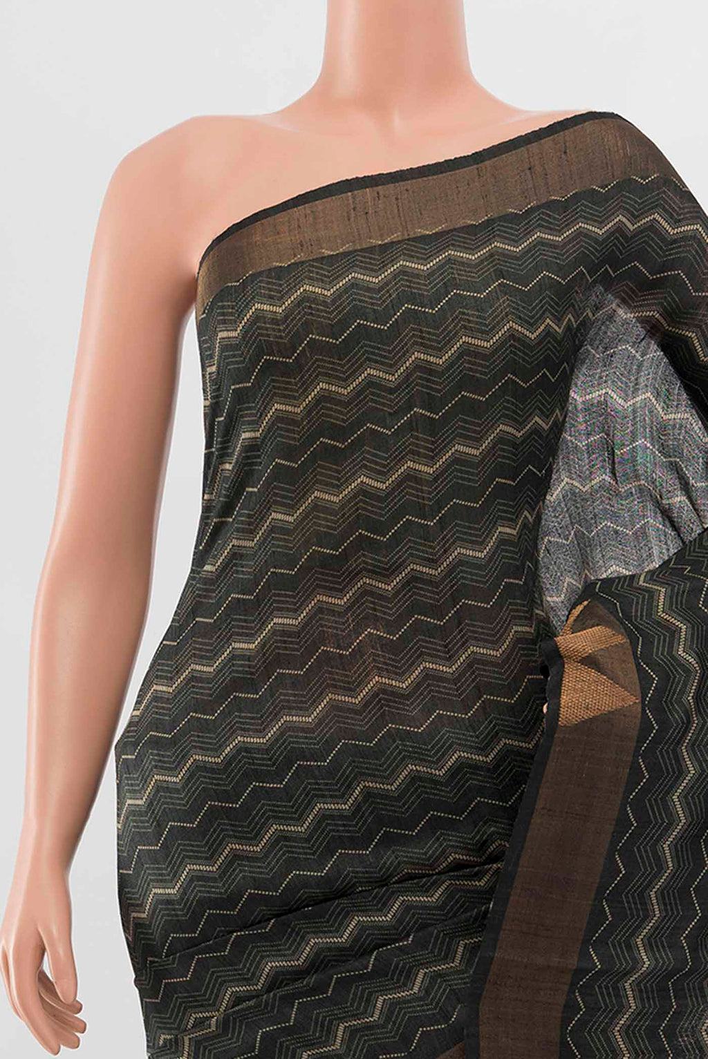 Border image of Black Tussar Silk Saree with Zari Butta on the body and Silk Border