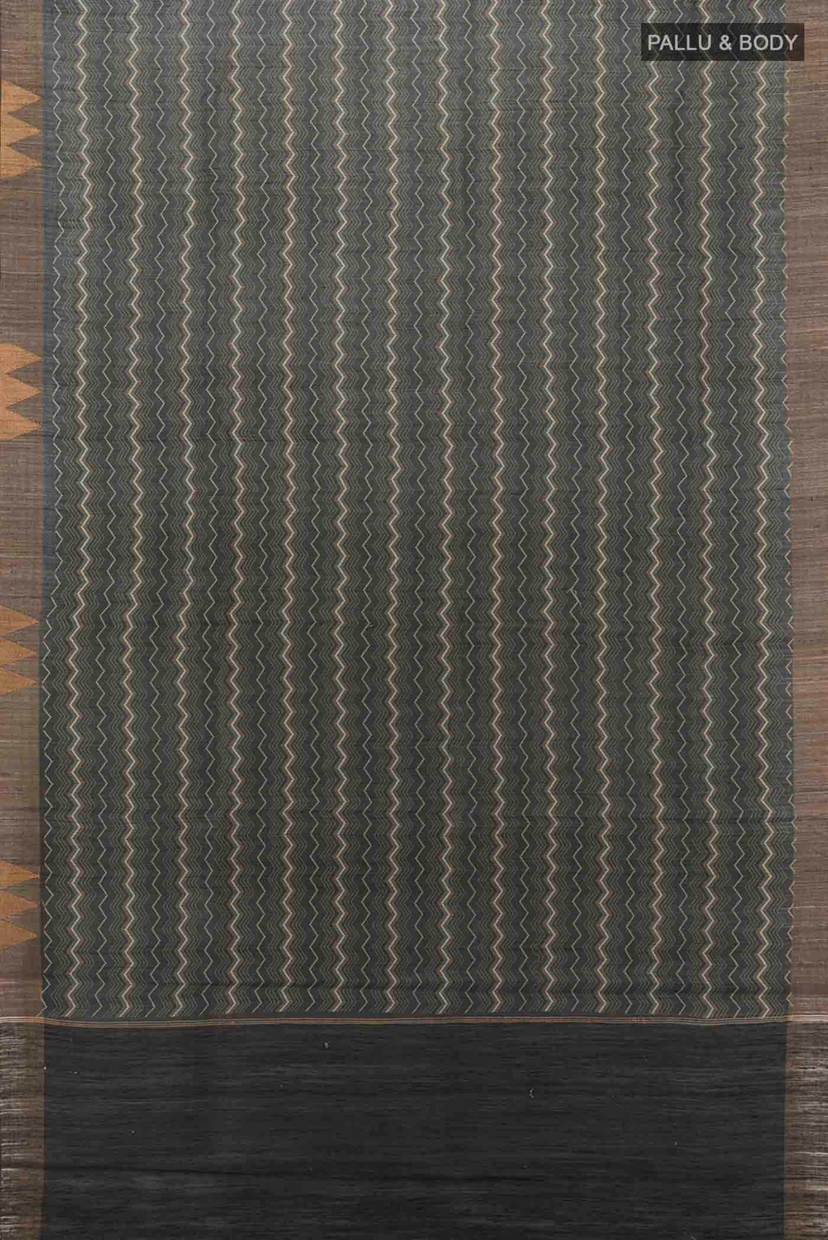 Flat view of Black Tussar Silk Saree with Zari Butta on the body and Silk Border