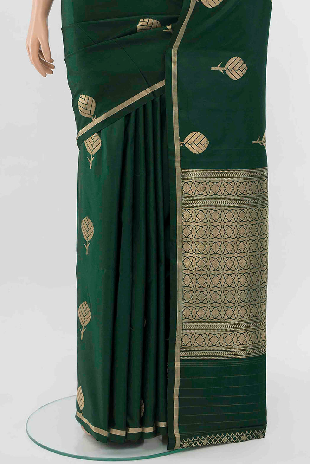 Pleats and pallu of Bottle Green Banarasi Silk Saree with Zari Butta on the body and Thin Zari Line