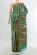 Multi Color Tussar Silk Saree with Printed design on the body and Zari Border.  displayed on a mannequin