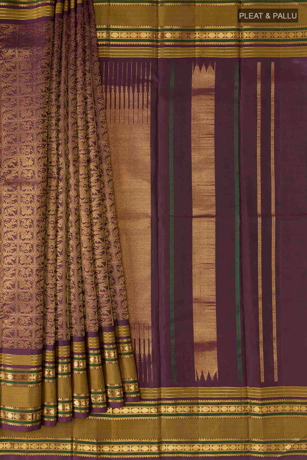 Pleats and pallu of Burgundy Kanchipuram Silk Saree with Zari Brocade on the body and Zari Border