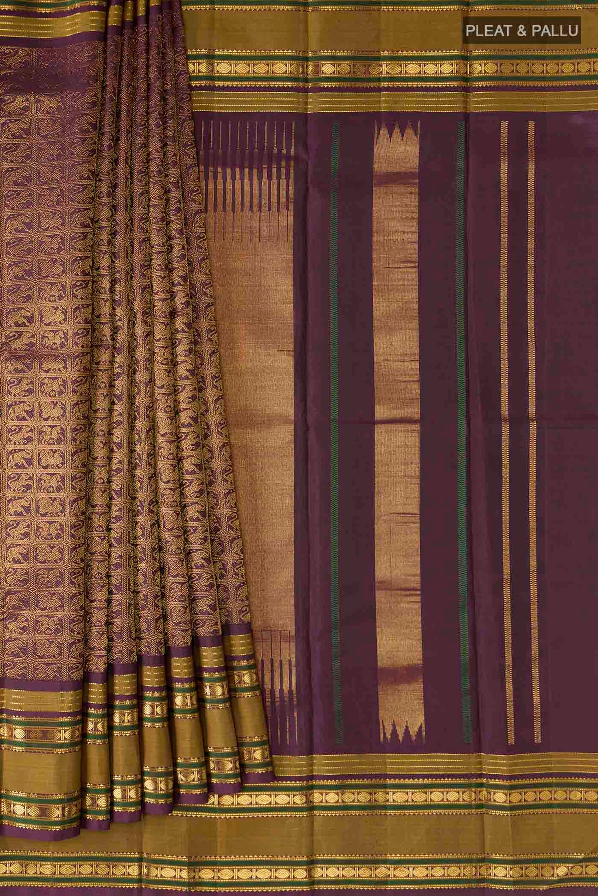 Pleats and pallu of Burgundy Kanchipuram Silk Saree with Zari Brocade on the body and Zari Border
