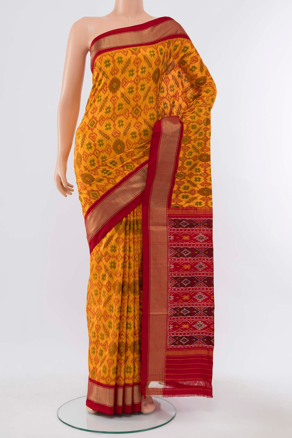 Mustard Pochampally Silk Saree with Zari Butta on the body and Silk Border displayed on a mannequin
