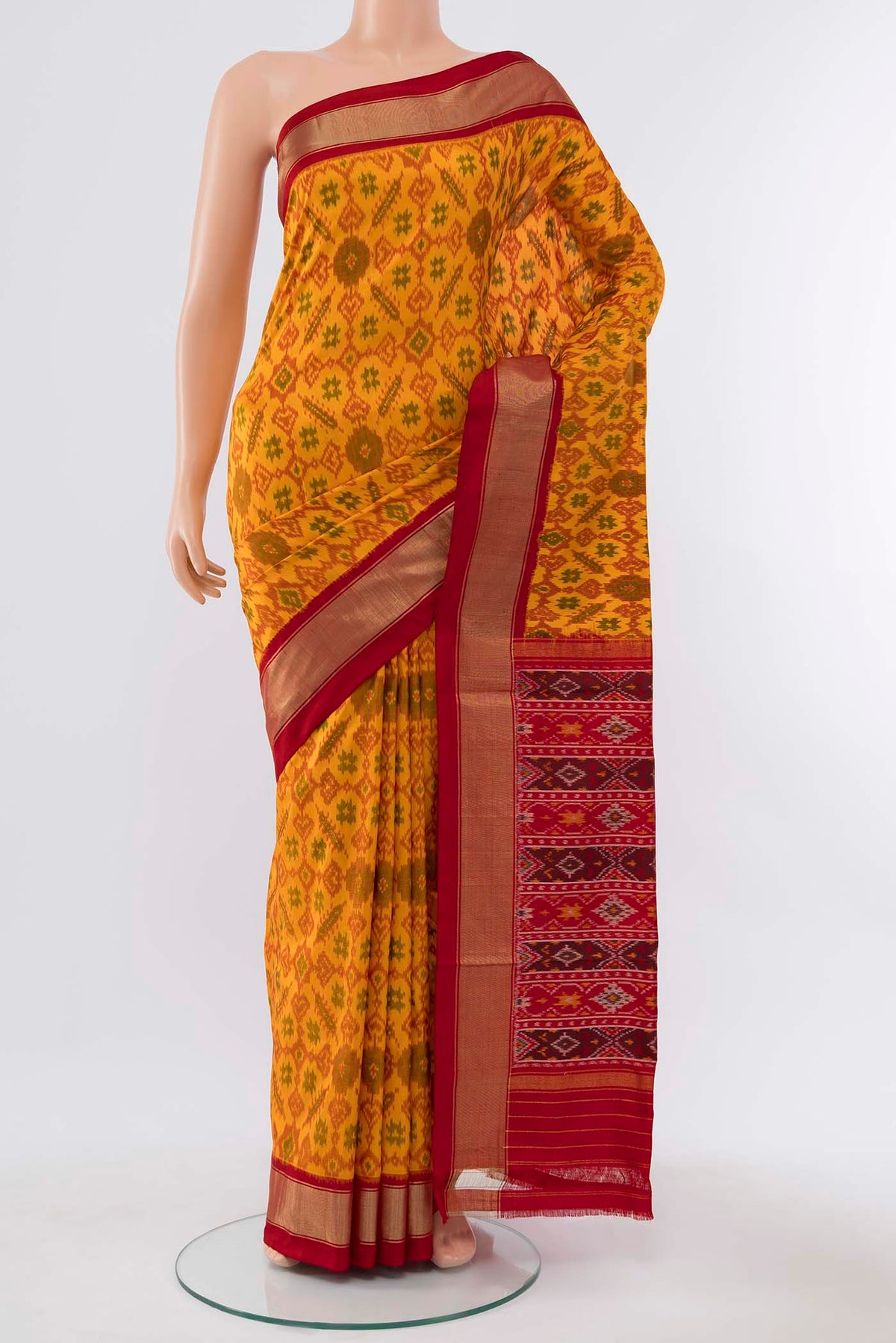 Mustard Pochampally Silk Saree with Zari Butta on the body and Silk Border displayed on a mannequin