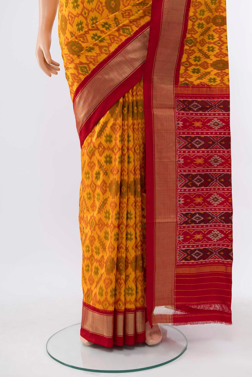Pleats and pallu of Mustard Pochampally Silk Saree with Zari Butta on the body and Silk Border