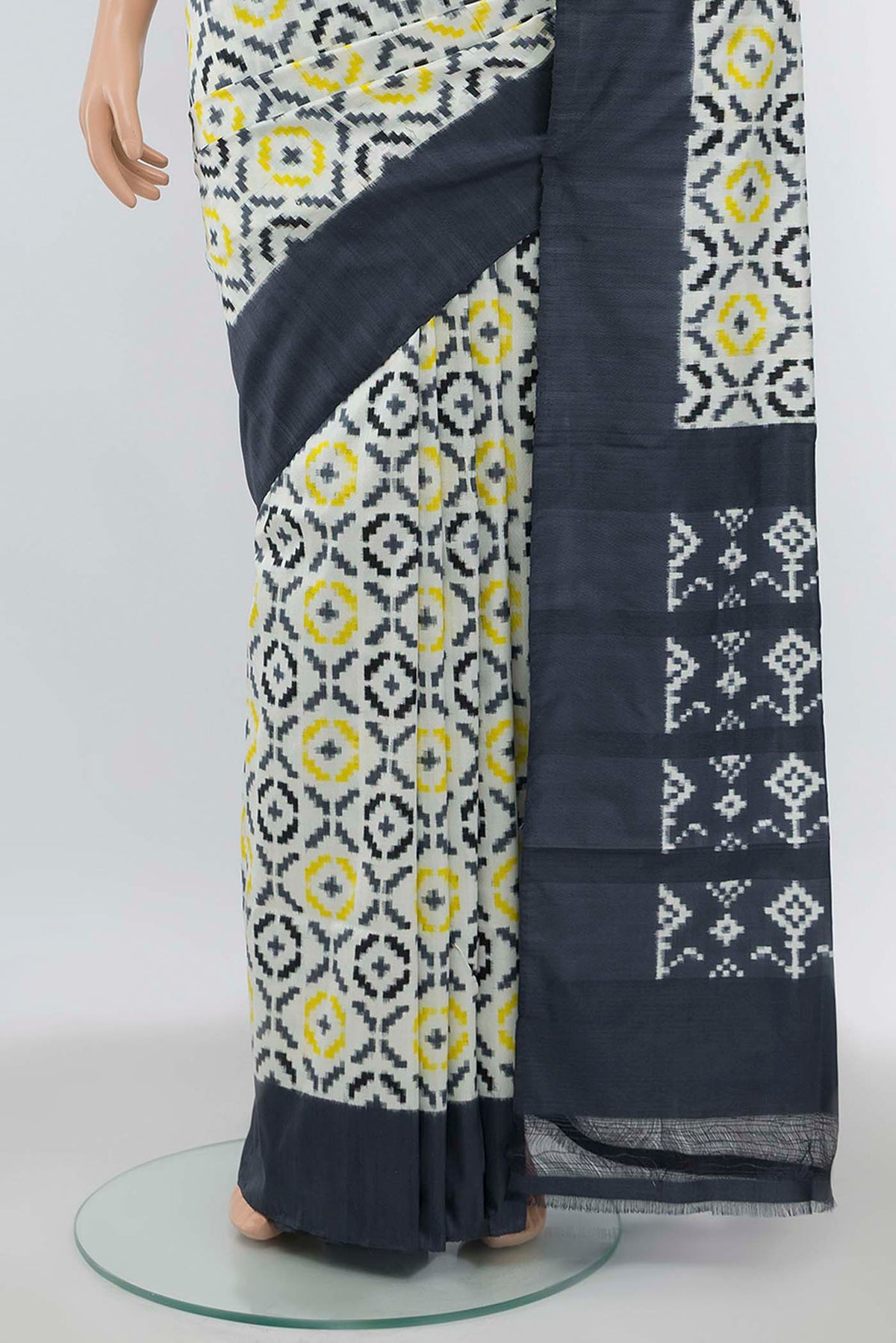 Pleats and pallu of Off White Pochampally Silk Saree with Ikat Print on the body and Silk Border