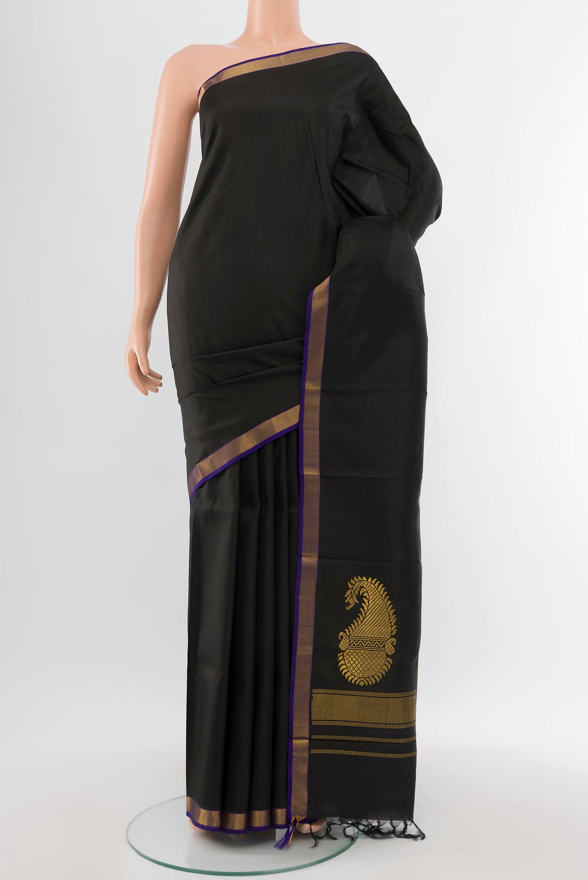 Pure Silk Pure Zari Black Kanjivaram Saree with Plain Body and Silk Border.  displayed on a mannequin