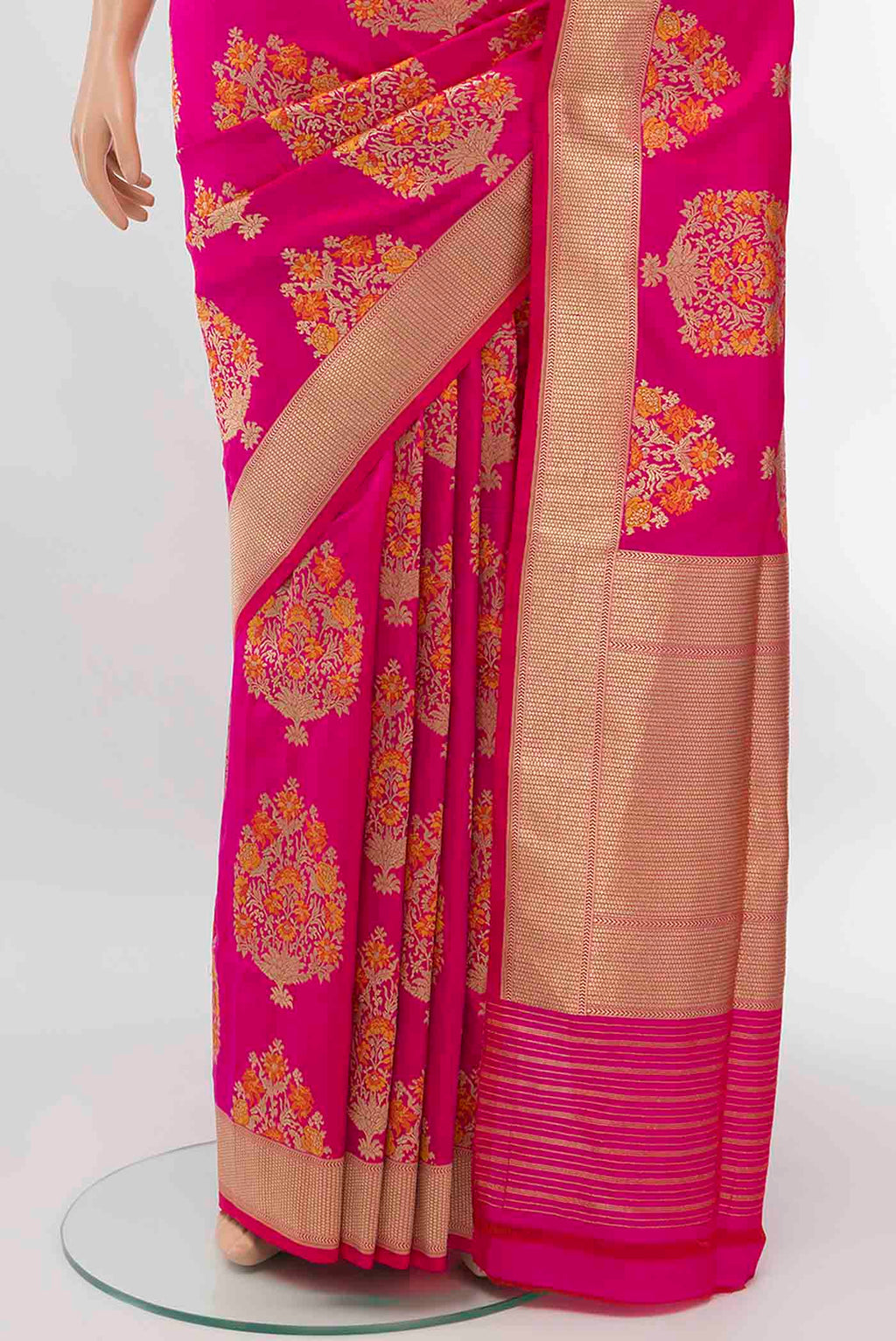 Pleats and pallu of Pure Silk Pure Zari Rani Pink Banarasi Saree with Zari Butta on the body and Attached Border
