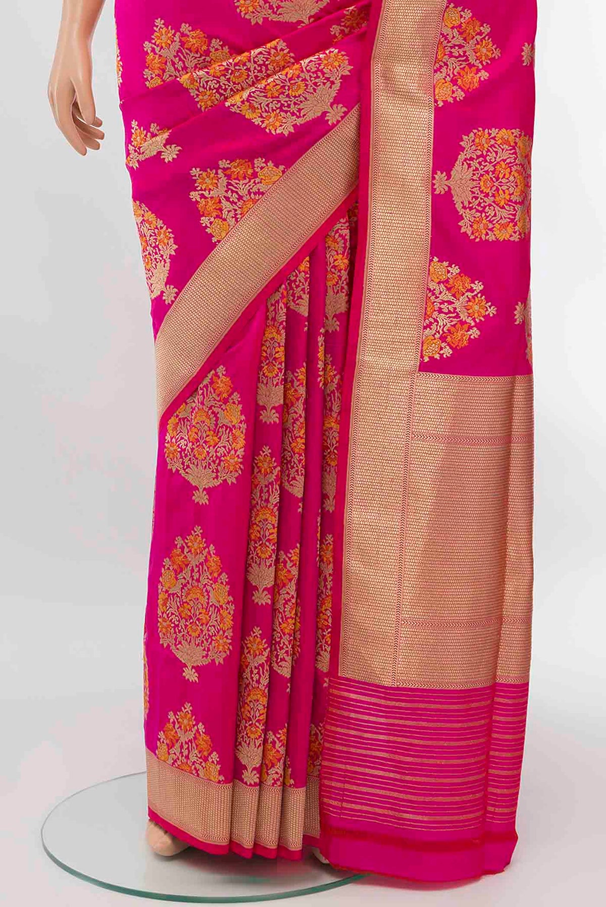 Pleats and pallu of Pure Silk Pure Zari Rani Pink Banarasi Saree with Zari Butta on the body and Attached Border