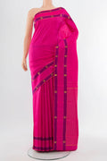 Rani Pink Kanchipuram Silk Saree with Zari Butta on the body and Silk Border.  displayed on a mannequin