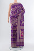 Violet Banarasi Katan Silk Saree with Zari Butta on the body and Silk Border.  displayed on a mannequin