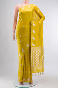 Yellow Banarasi Silk Saree with Zari Butta on the body and Zari Border displayed on a mannequin