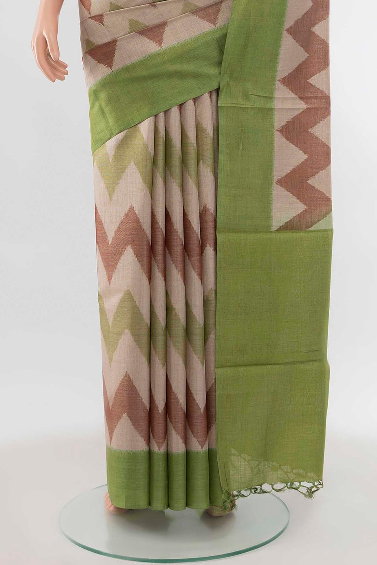 Pleats and pallu of Pista Green Tussar Silk Saree with Zari Brocade on the body and Silk Border