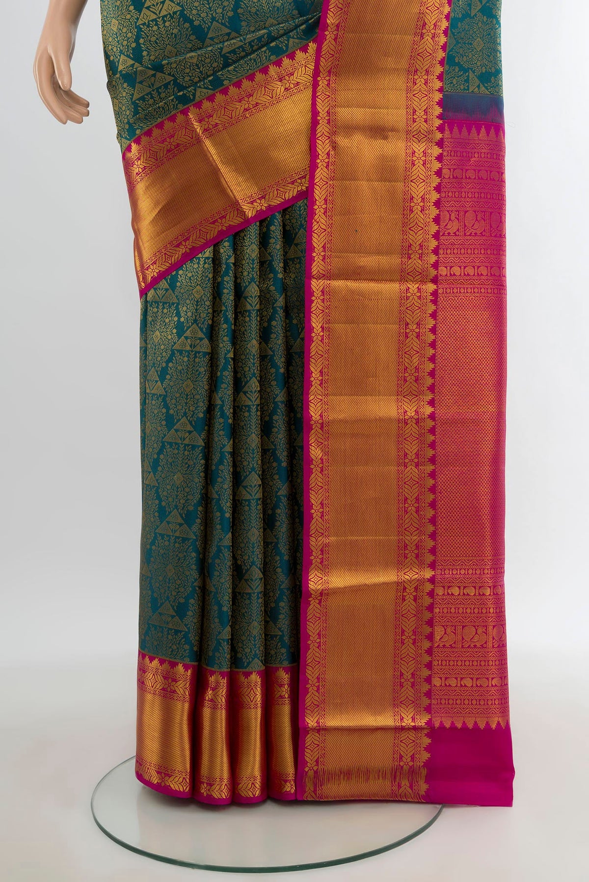 Pleats and pallu of Peacock Blue Kanchipuram Silk Saree with Zari Brocade on the body and Zari Border. 