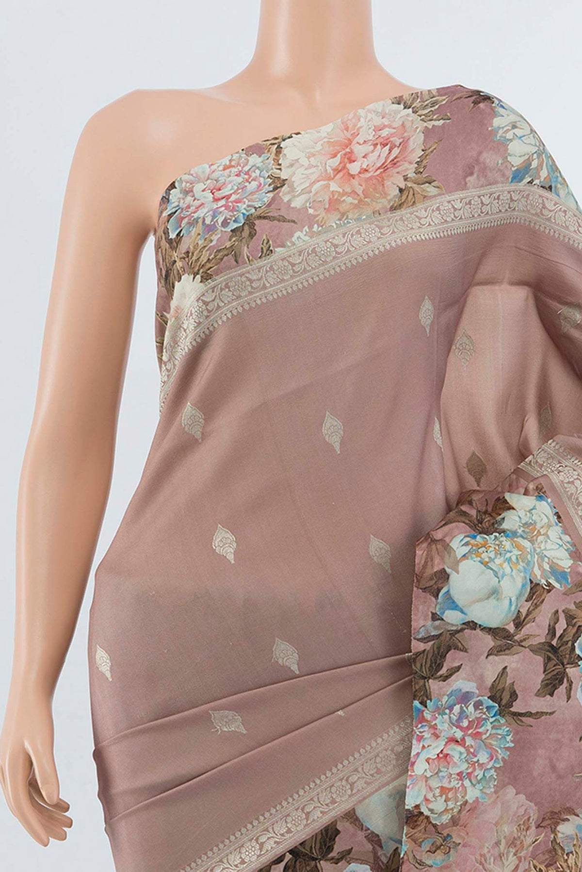 Border image of Pure Silk Pure Zari Peach Printed Saree with Floral Print on the body and Fancy Border