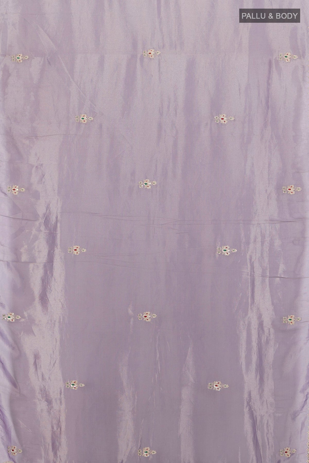 Flat view of Lavender Tissue Silk Saree with Embroidery on the body and Embroidery Border. 
