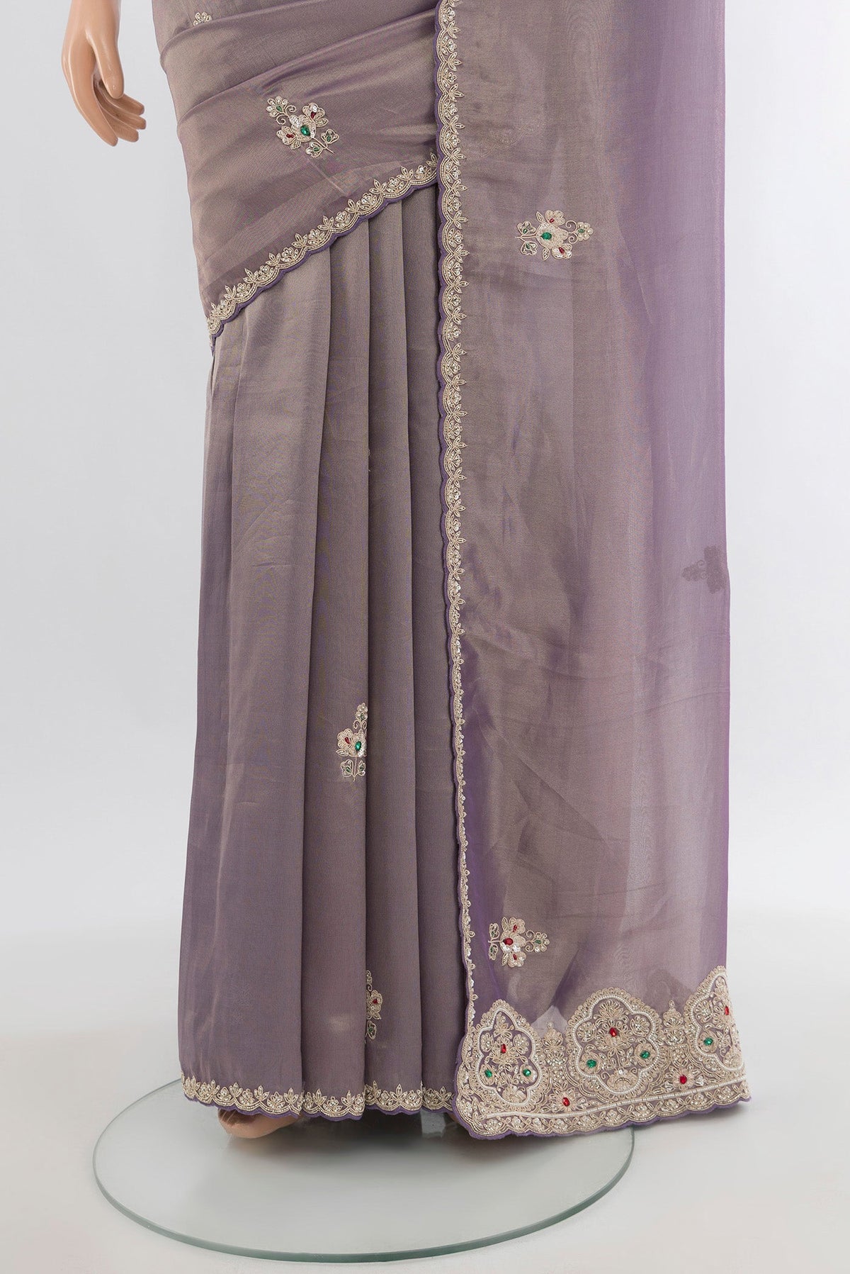 Pleats and pallu of Lavender Tissue Silk Saree with Embroidery on the body and Embroidery Border. 