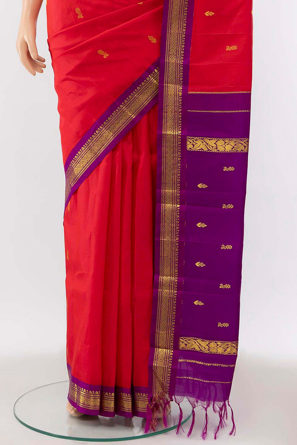 Pleats and pallu of Pink Kanchipuram Silk Saree with Zari Butta on the body and Silk Border