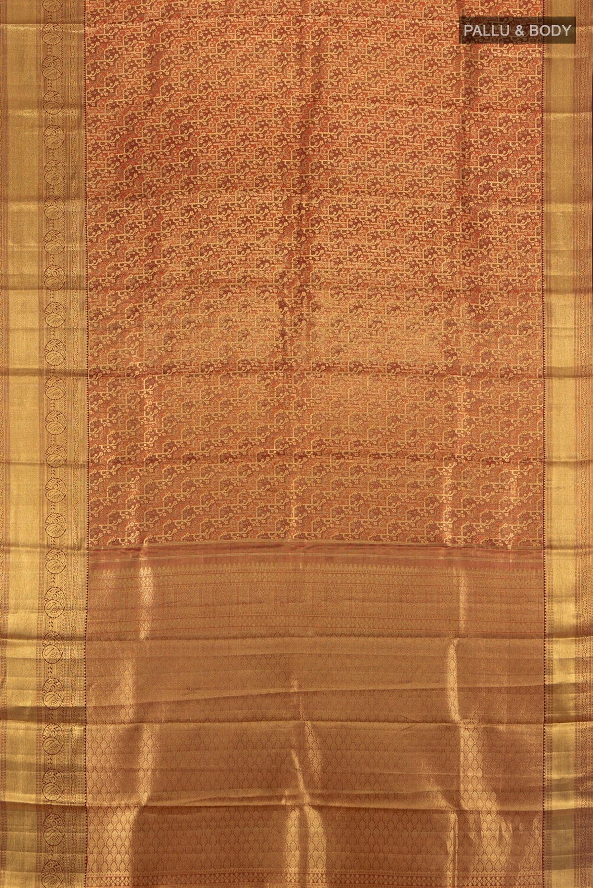 Flat view of Golden Kanchipuram Silk Saree with Zari Butta on the body and Silk Border. 