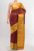 Magenta Kanchipuram Silk Saree with Zari Brocade on the body and Silk Border displayed on a mannequin