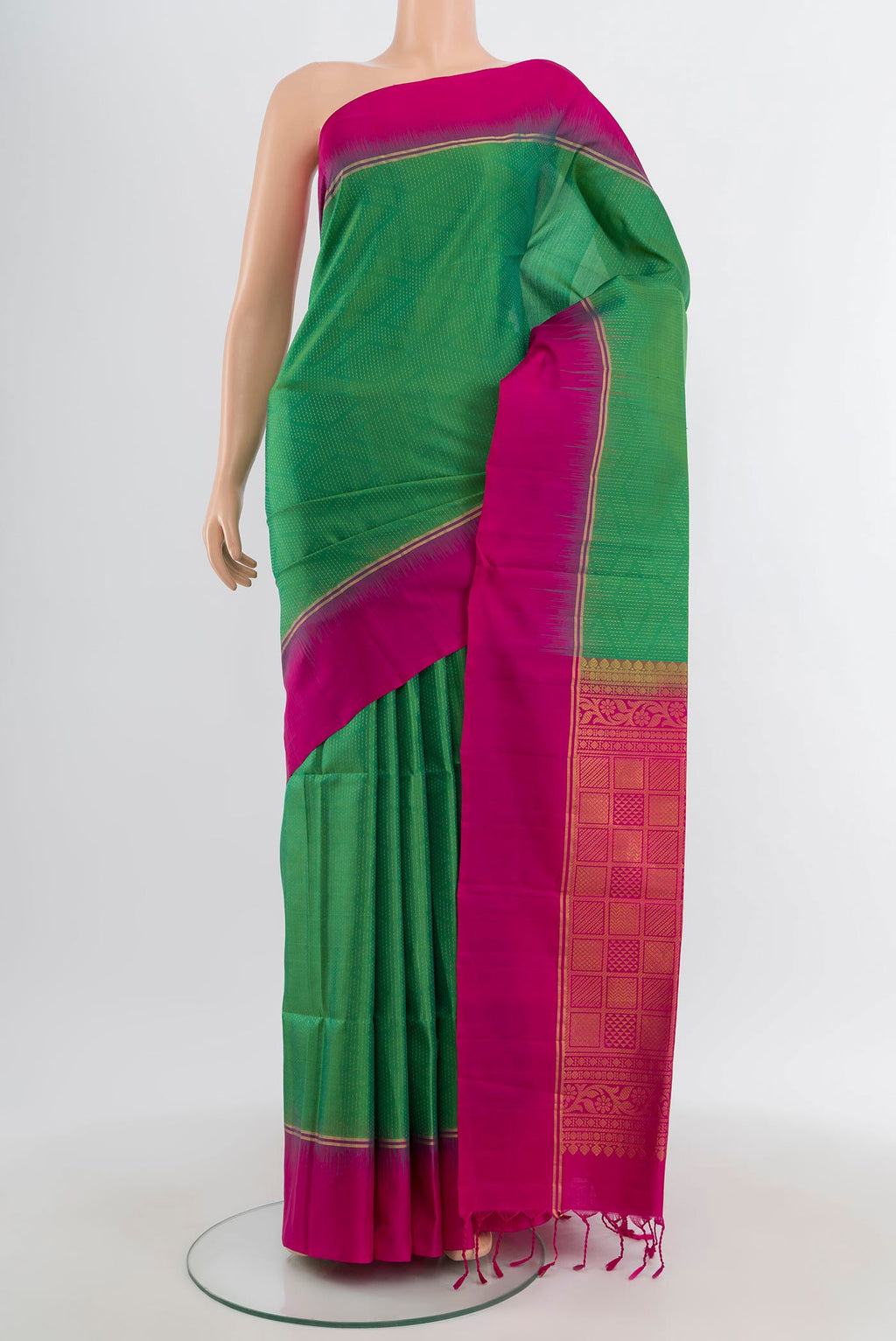 Light Green Soft Silk Saree with Stripes on the body and Plain Border.  displayed on a mannequin
