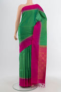 Light Green Soft Silk Saree with Stripes on the body and Plain Border.  displayed on a mannequin