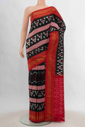 Black Pochampally Silk Saree with Pure Ikat on the body and Zari Border displayed on a mannequin
